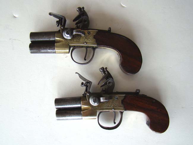 A fine pair of Henry Nock double barrel brass frame flintlock pocket pistols circa 1775-1785 — image 3